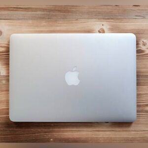 MacBook Pro  with 13 inch screen, 8GB and Trackpad. Older machine see below